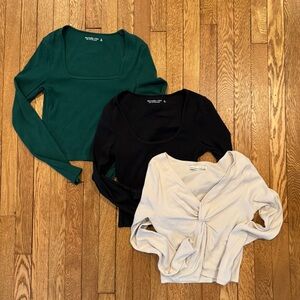 Abercrombie & Fitch Set of Three Long Sleeve Tops in Green, Black, and Cream